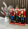 Ushtar Nutcracker Dekorativ – Figurinë Festive e Krishtlindjeve, 3 Modelle, Ngjyra të Ndritshme